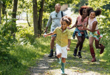 Family walking in the woods