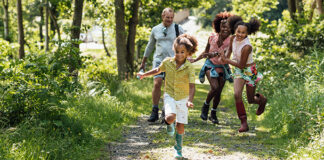 Family walking in the woods
