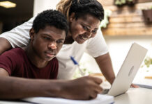 Mom helping son with homework