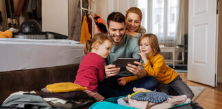Family looking at a tablet