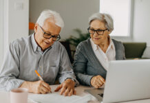 Couple sitting at a computer together