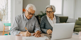 Couple sitting at a computer together
