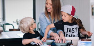 Woman baking with her children