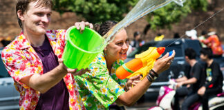 2 people having a water fight
