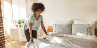Woman making the bed