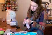 Woman sewing menstrual pads